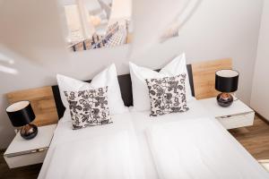 Postelja oz. postelje v sobi nastanitve Leonhardsblick Appartements