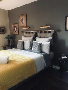 Voodi või voodid majutusasutuse B&B du Cloître toas