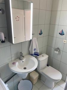 Kúpeľňa v ubytovaní Apartman Delfin + 20 fotografií