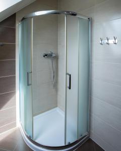 Ein Badezimmer in der Unterkunft Apartamenty na Pienińskim Wzgórzu