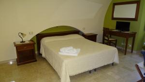 Katil atau katil-katil dalam bilik di CATANIA - Historic B&B Apartments Home