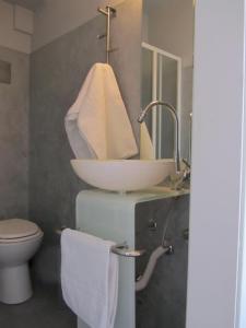 A bathroom at Borgo Antico Apartments