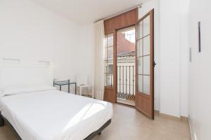 Ein Bett oder Betten in einem Zimmer der Unterkunft Apt Costa Dorada 2 by MarCalma