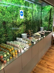 a buffet line with food in front of a forest at Hotel-Restaurant Ochsen in Blaubeuren