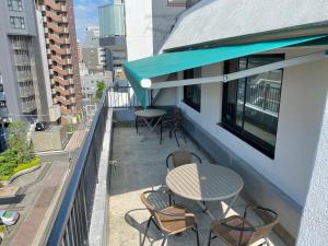 En balkon eller terrasse på TOKYO-W-INN Asakusa