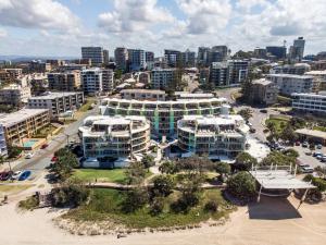 an aerial view of a city with tall buildings at Rolling Surf Resort in Caloundra