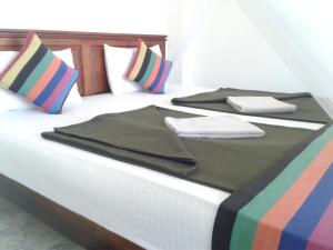 A bed or beds in a room at Two Rock Vista