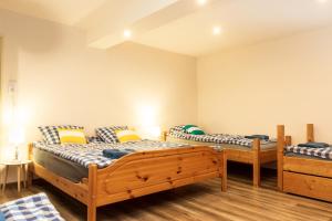 מיטה או מיטות בחדר ב-Olivia Apartman