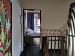 Postel nebo postele na pokoji v ubytování Madera House Chiang Mai