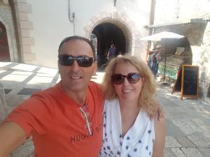 a man and a woman posing for a picture at Apartments Popovic in Kotor