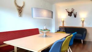 Televízia a/alebo spoločenská miestnosť v ubytovaní Haus Veronika - Appartements by Miha