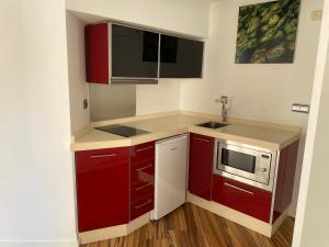 Kuchyň nebo kuchyňský kout v ubytování Cosy Apartment - La Manga, km 7