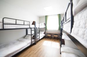 Giường trong phòng chung tại Dongwon Youthhostel