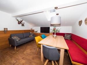 Televízia a/alebo spoločenská miestnosť v ubytovaní Haus Veronika - Appartements by Miha