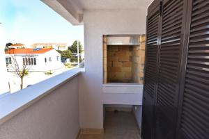 Fotografie z fotogalerie ubytování Apartmani Astrado Petrčane v destinaci Petrcane