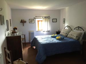 Giường trong phòng chung tại Casina Della Burraia