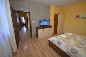 Posteľ alebo postele v izbe v ubytovaní Apartmány Best I. Bešeňová