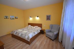 Posteľ alebo postele v izbe v ubytovaní Apartmány Best I. Bešeňová
