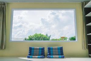 Afbeelding uit fotogalerij van RiverTree House in Nong Khai +43 foto's