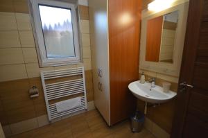 Kúpeľňa v ubytovaní Apartmány Best I. Bešeňová