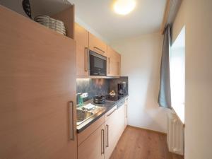 Kuchyňa alebo kuchynka v ubytovaní Haus Veronika - Appartements by Miha