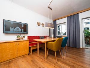 Televízia a/alebo spoločenská miestnosť v ubytovaní Haus Veronika - Appartements by Miha