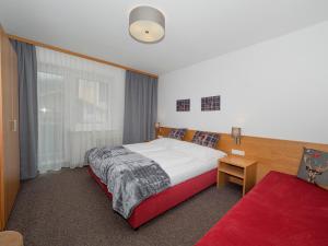 Posteľ alebo postele v izbe v ubytovaní Haus Veronika - Appartements by Miha