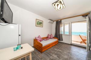 Μια τηλεόραση ή/και κέντρο ψυχαγωγίας στο Apartmani Por
