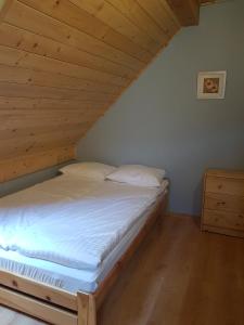 Postel nebo postele na pokoji v ubytování CIME Ekonomik