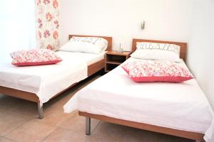 Postel nebo postele na pokoji v ubytování Apartment Prancic