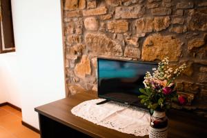 TV a/nebo společenská místnost v ubytování L'Antica Passolara