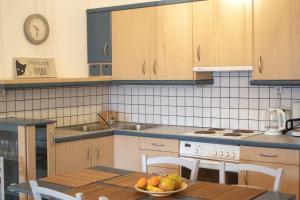 A kitchen or kitchenette at Pine Trees and Sea View Houses in Hydra - Daphne, Chloe, Myrto, Eleni