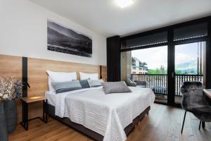 Postel nebo postele na pokoji v ubytování Tee House Čeladná