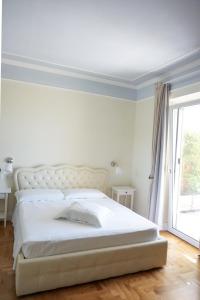 Posteľ alebo postele v izbe v ubytovaní Aquae Sinis Albergo Diffuso