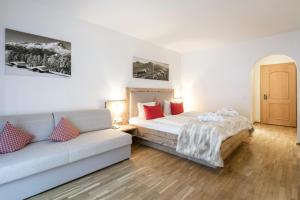 Posteľ alebo postele v izbe v ubytovaní Sporthotel by Alpenlodge + 37 fotografií