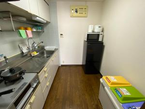 Η κουζίνα ή μικρή κουζίνα στο Residential Hotel Bevel Tokyo