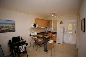 Køkken eller tekøkken på Playa De Mogan Mirador 8 by El Sirocco