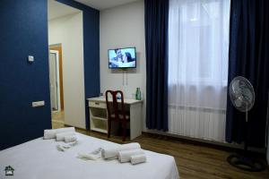 TV a/nebo společenská místnost v ubytování Guest House in Gyumri