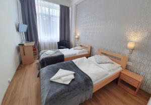 Postel nebo postele na pokoji v ubytování Hotel Preveza + 29 fotografií