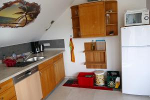 Kuchyň nebo kuchyňský kout v ubytování Ferienwohnung Mechernich-Eifel