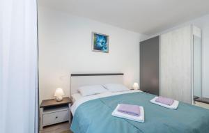 Postel nebo postele na pokoji v ubytování Apart Residence Blue Sea