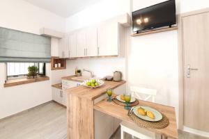 Kuchyň nebo kuchyňský kout v ubytování Elia Luxury Suite, Corfu Town