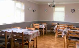 Un restaurante o sitio para comer en Brassil Bed and Breakfast