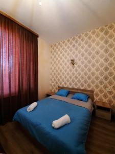 Voodi või voodid majutusasutuse Hotel Alley toas