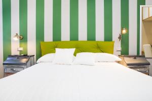 Un pat sau paturi într-o cameră la Il Castello