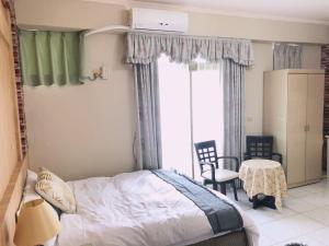 A bed or beds in a room at Chia Yun Homestay