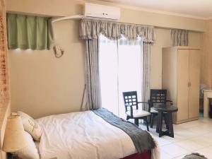 A bed or beds in a room at Chia Yun Homestay
