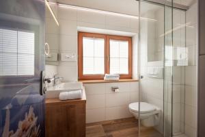Koupelna v ubytování Hotel Garberwirt