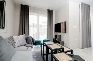 TV a/nebo společenská místnost v ubytování Luxury Villa MetraMaris1
