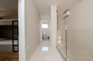 Postel nebo postele na pokoji v ubytování Luxury Villa MetraMaris1